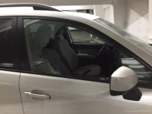 vandalism broken car window